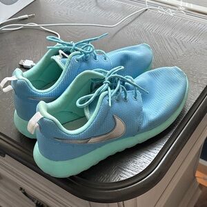 Nike Aqua Blue Sneakers with Silver Accents